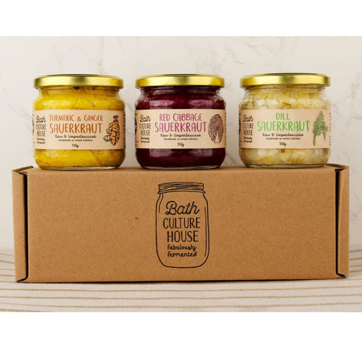 Three jars of sauerkraut on a cardboard box with 'Bath Culture House' branding.