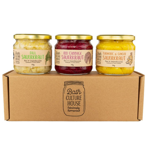 Three jars of sauerkraut on a cardboard box with 'Bath Culture House' branding.