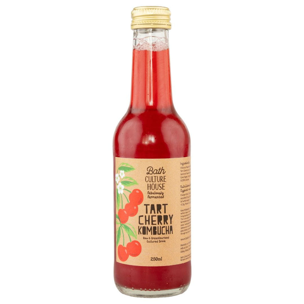Bottle of Bath Culture House Tart Cherry Kombucha on a white background