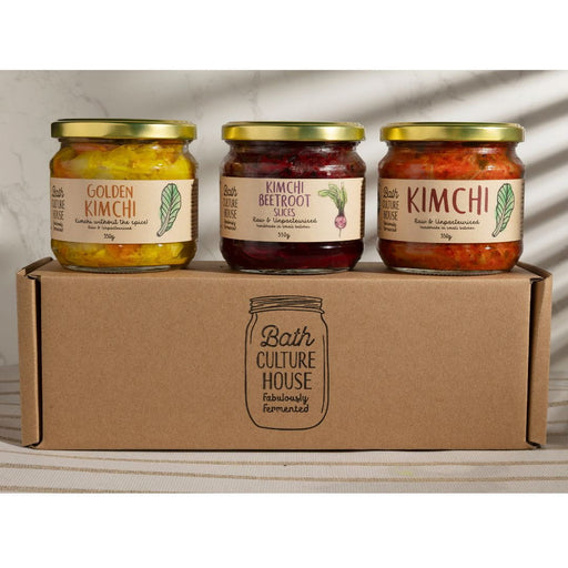 Three jars of kimchi on a cardboard box with 'Bath Culture House' branding.